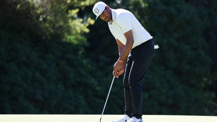 Tony Finau of the United States putts on the 12th green during the first round of The Genesis Invit...
