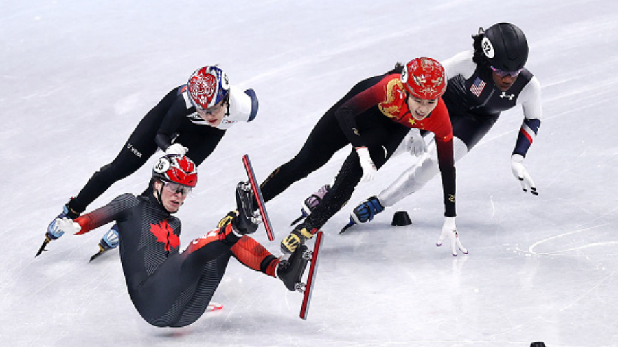 BEIJING, CHINA - FEBRUARY 09: Kim Boutin of Team Canada falls as Yubin Lee of Team South Korea , Ch...