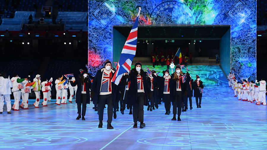 BEIJING, CHINA - FEBRUARY 04: Flag bearers Eve Muirhead and Dave Ryding of Team Great Britain lead ...