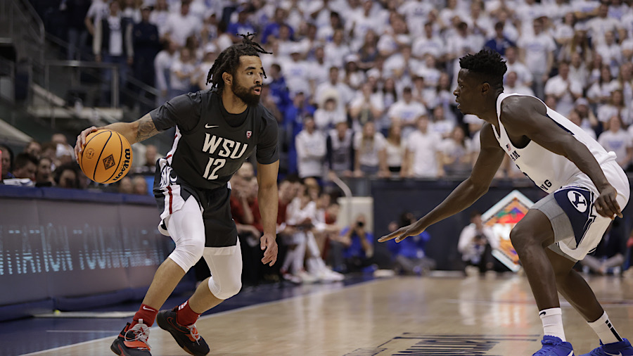 Washington State guard Michael Flowers with the ball against BYU...