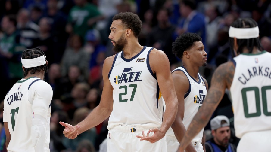 Utah Jazz players look on in frustration (Photo by Tom Pennington/Getty Images)...
