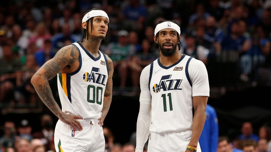 Utah Jazz guards Mike Conley and Jordan Clarkson (Photo by Tim Heitman/Getty Images)...