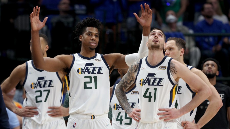 Utah Jazz players react in a game against the Dallas Mavericks (Photo by Tom Pennington/Getty Image...