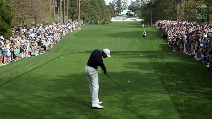 Tiger Woods of the United States plays his shot from the seventh tee during a practice round prior ...