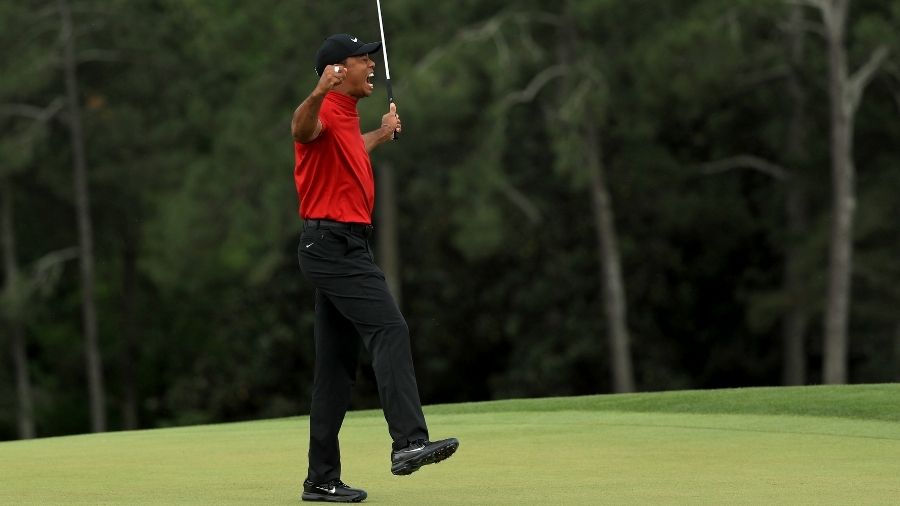 Tiger Woods of the United States celebrates winning the Masters during the final roubnd at Augusta ...