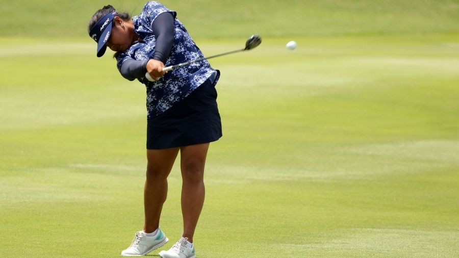Dottie Ardina of the Philippines plays her shot on the eighth hole during the final round of the KP...
