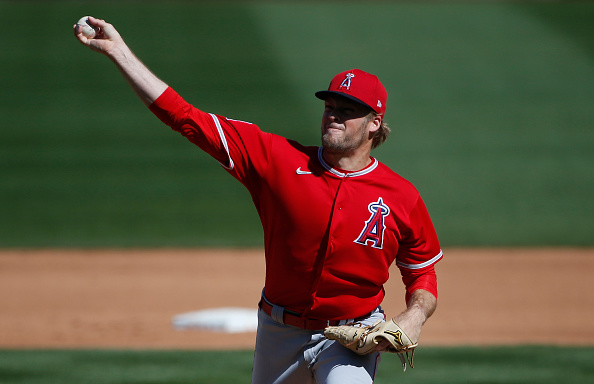 SCOTTSDALE, ARIZONA - MARCH 04: Ty Buttrey #31 of the Los Angeles Angels throws against the Arizona...