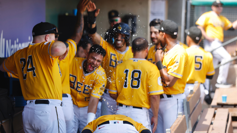 salt-lake-bees-players-celebrate-in-dugout...