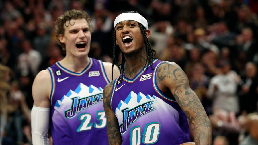 Utah Jazz forward Lauri Markkanen (23) and Utah Jazz guard Jordan Clarkson (00) react as the Utah J...