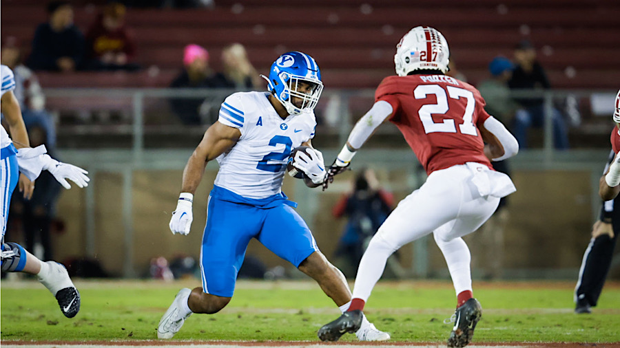 BYU running back Chris Brooks carries the ball against Stanford...