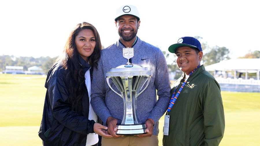 Tony-Finau-and-family-pose-with-Houston-Open-Trophy...