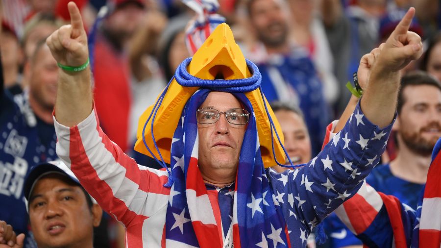 USA-Fan-Wearing-Cheesehead-Celebrates-In-Qatar...