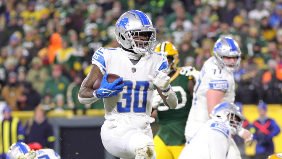 Detroit Lions running back Jamaal Williams (30) rushes for a thjird quarter touchdown against Green Bay Packers during their football game on Sunday, January, 8, 2023 at Lambeau Field in Green Bay, Wis. Wm. Glasheen USA TODAY NETWORK-Wisconsin 