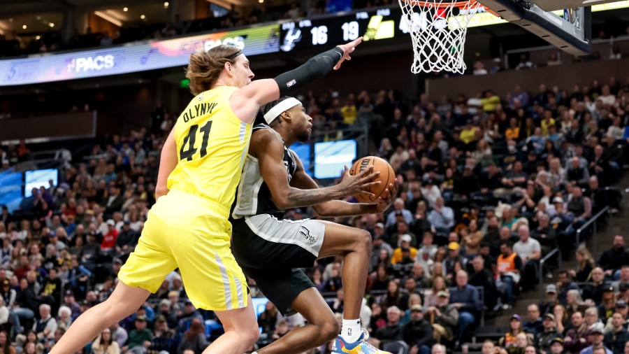 Kelly Olynyk defends a shot against the San Antonio Spurs...