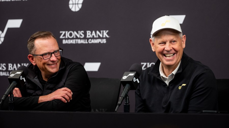 Utah Jazz general manager Justin Zanik and Utah Jazz CEO Danny Ainge talk to journalists during an ...