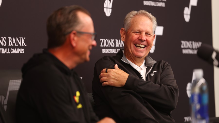 Utah Jazz general manager Justin Zanik and Jazz CEO Danny Ainge laugh during a press conference at ...