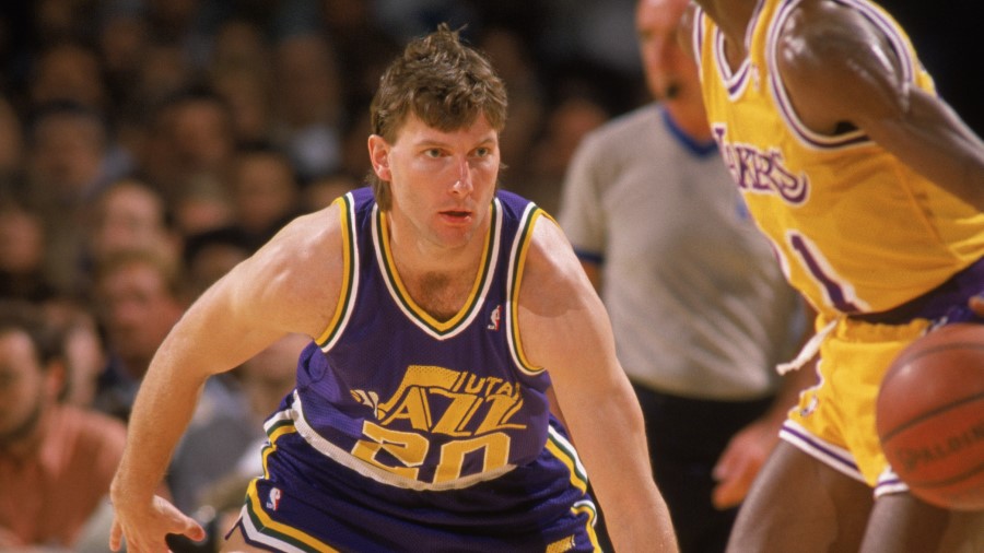 Bobby Hansen #20 of the Utah Jazz plays defense during an NBA game against the Los Angeles Lakers...