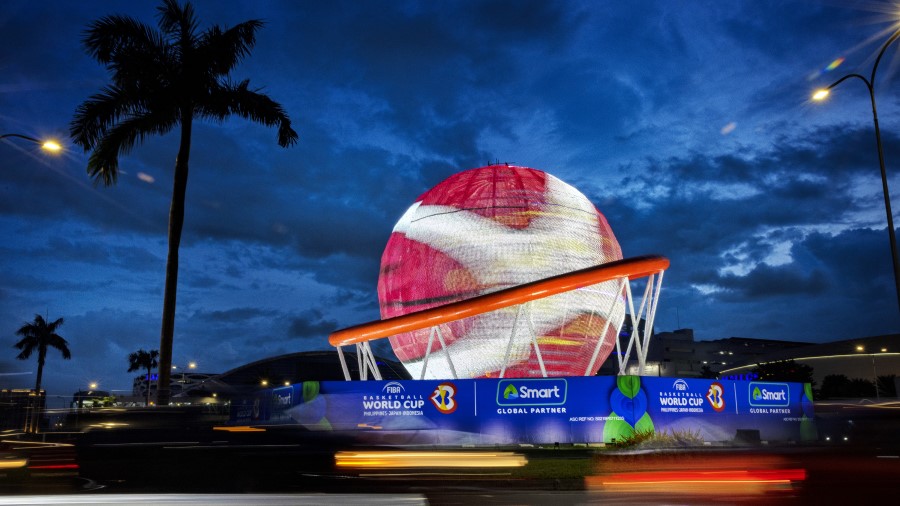Motorists pass a giant FIBA World Cup themed display ahead of the FIBA World Cup...