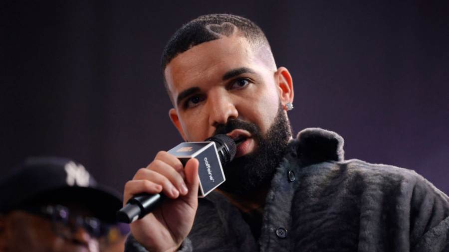 Drake Seen Wearing BYU Football Jersey During Concert Tour