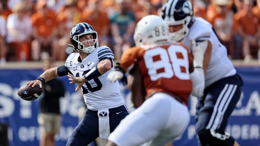 Kedon Slovis #10 of the Brigham Young Cougars throws a pass in the first half against the Texas Lon...