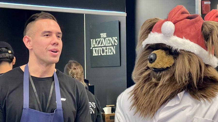 Utah Jazz chef Anthony Zamora and the Jazz Bear stand in front of The Jazzmen's Kitchen...