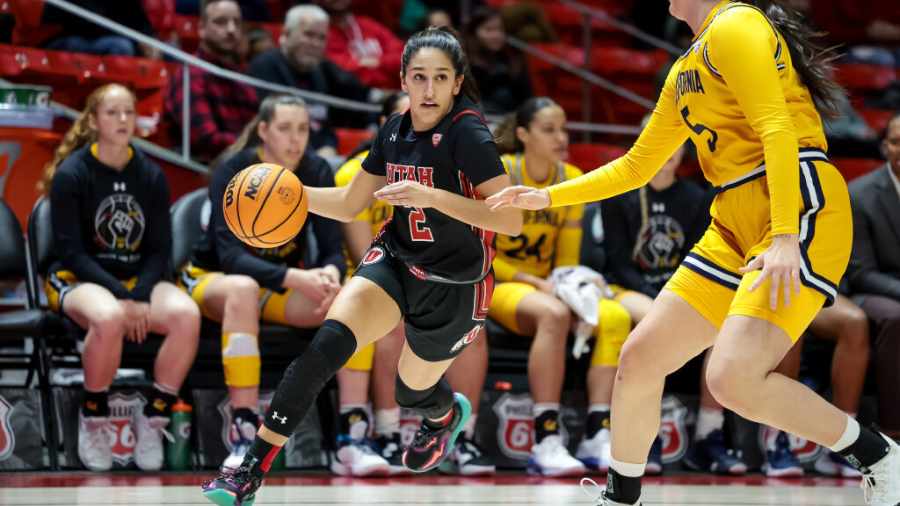 ines-vieira-dribbles-the-ball-against-cal-in-the-huntsman-center-2023...