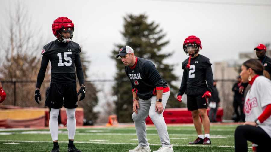 tao-johnson-gets-feedback-from-morgan-scalley-during-utah-spring-practices-2024...