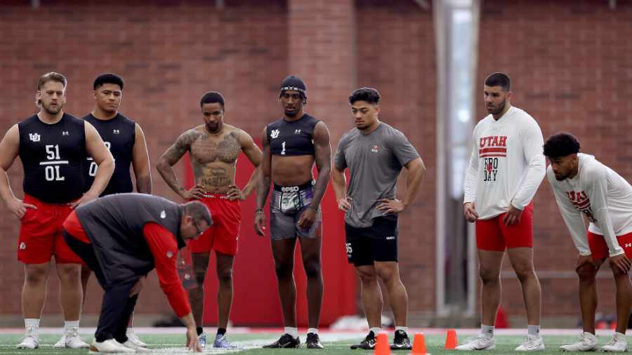 former-utes-get-instruction-from-nfl-scout-before-drill-at-utah-pro-day-2024...