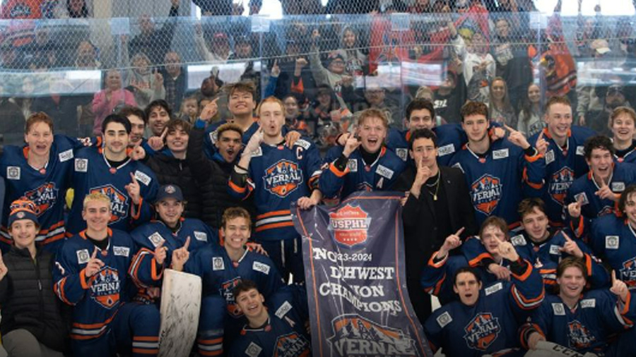 Vernal Oilers hold up championship banner...