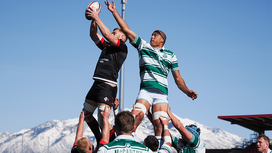 utah warriors players goes up for ball...