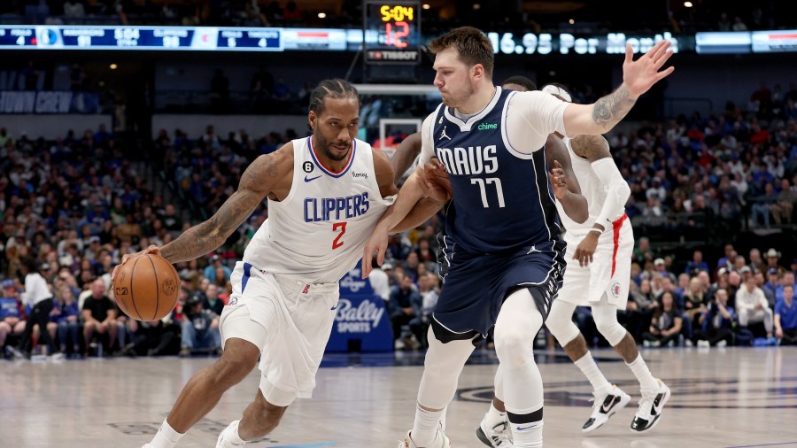 Kawhi Leonard #2 of the LA Clippers drives to the basket against Luka Doncic #77 of the Dallas Mavericks