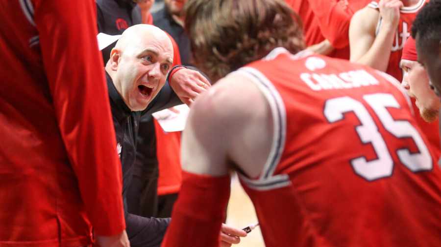 craig-smith-talks-to-utes-in-huddle-during-nit-semifinal-2024...