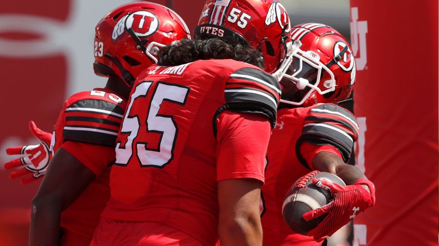 SALT LAKE CITY, UT - SEPTEMBER 7: Money Parks #10 of the Utah Utes celebrates scoring a touchdown w...