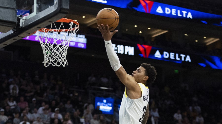 Utah Jazz guard Keyonte George (3) puts up a shot during a NBA preseason game against the Sacrament...